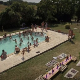 Aerial view of wedding pool party